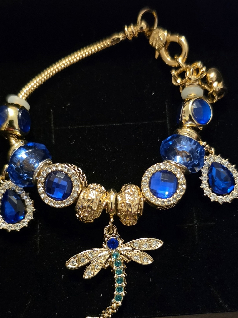 Gold-Plated Bracelet with Blue Crystal Charms and Dragonfly Pendant